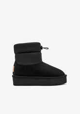 Black Australian-style lace-up boots