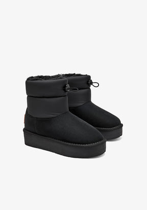 Black Australian-style lace-up boots